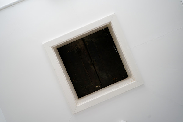 Bullnose architrave framing a loft hatch