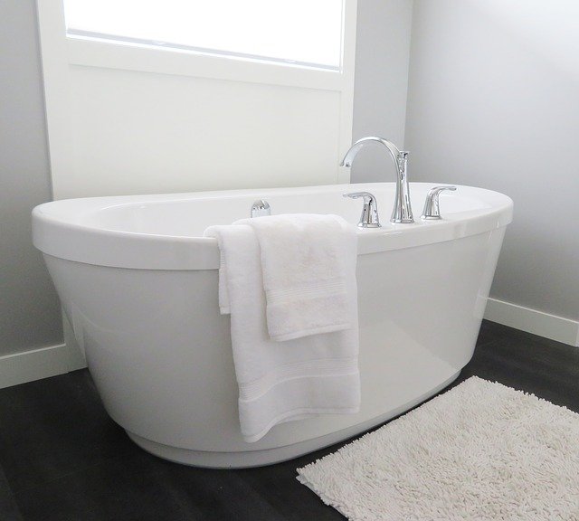 White bathtub with skirting