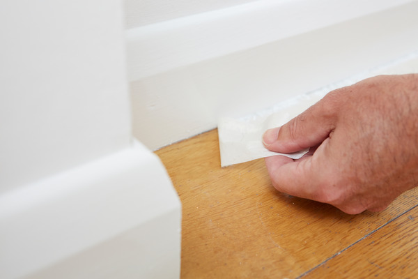 Photograph showing painters tape on floor