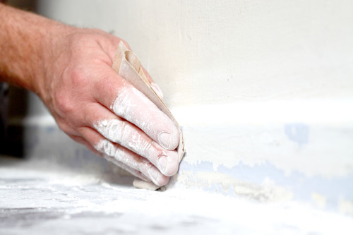 Sanding The Old Paint Off Skirting Boards