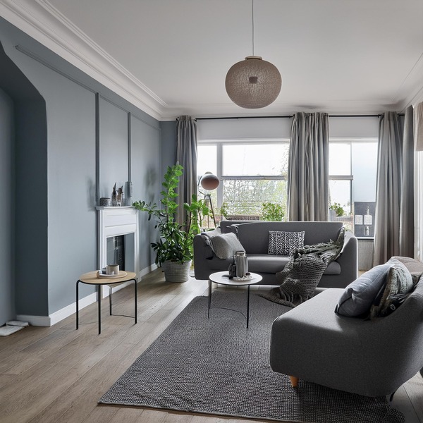 Scandinavian living room with grey features creating a balanced and cosy space.