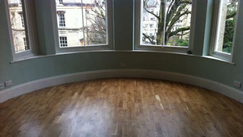 A Skirting Board Fitted Around The Inside Of A Bay Window Area